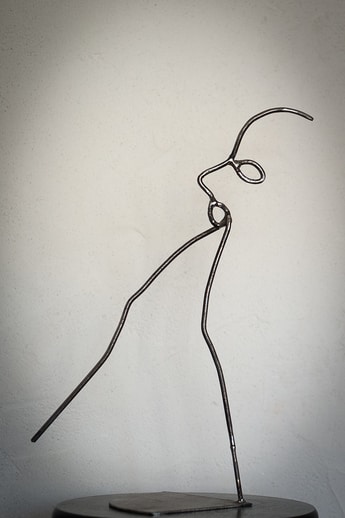 série Danseur-visage : sculpture en fer